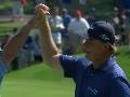 Ernie Els dunks his approach for eagle at Quicken Loans