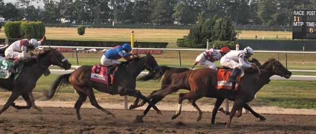 Drosselmeyer (#7) leads into the stretch, followed by First Dude, Game On Dude (#8)