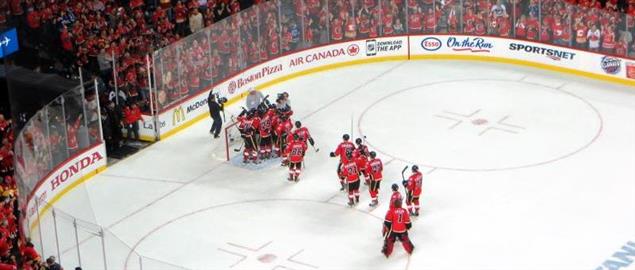 Calgary Flames celebrate after eliminating the Canucks in the first round of '15 Playoffs.