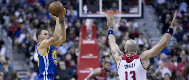Steph Curry of the Golden State Warriors shooting against Wizard's Gortat, 2/28/17. 